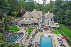 LUXURIOUS LIVING IN THIS STUNNING CUSTOM COLONIAL WITH BACKYARD OASIS