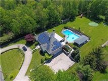 RESORT LIVING IN A STUNNING CUSTOM HOME IN NEW CITY