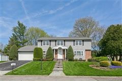 BEAUTIFUL AND BRIGHT CENTER HALL COLONIAL IN PRESTIGEOUS BLOOMINGDALE ESTATES