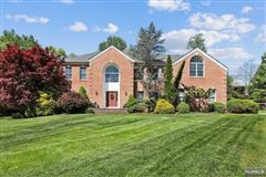 CHARMING CENTER HALL COLONIAL ON PRIVATE CUL-DE-SAC