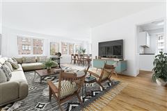 A SPACIOUS CORNER CONDOMINIUM
