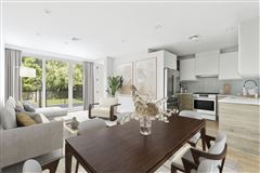 BOUTIQUE CONDO ON A QUIET TREE-LINED STREET