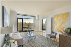 GORGEOUS CORNER THREE BEDROOM FLOOR-THROUGH HOME