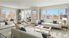 BREATHTAKING PANORAMIC VIEWS FROM THIS IMPRESSIVE HOME IN ONE OF MANHATTAN'S FINEST LUXURY BUILDINGS