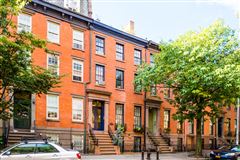 VERSATILE THREE-FAMILY TOWNHOUSE OPPORTUNITY