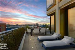 GRAND SCALE CONVERTIBLE TWO BEDROOM PLUS DEN RESIDENCE