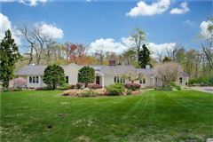 SPACIOUS RANCH SET ON A BEAUTIFUL PROPERTY