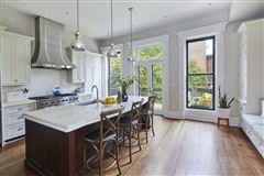 EXPERTLY RENOVATED TWO-FAMILY BROWNSTONE