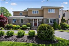 FULLY RENOVATED CENTER HALL COLONIAL ON A QUAINT STREET
