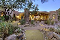 THIS DRAMATIC RESIDENCE OFFERS PANORAMIC MOUNTAIN AND VALLEY VIEWS