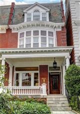 EXCEPTIONAL TOWNHOUSE WITH ORIGINAL FEATURES PRESERVED THROUGHOUT