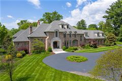 EXQUISITE HOME ON THREE ACRES IN THE HEART OF LADUE