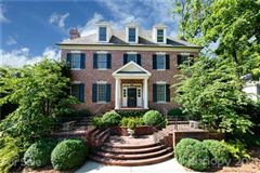 ELEGANT BRICK GEORGIAN ON MANICURED PRIVATE LOT
