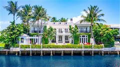 GATED TROPICAL GEORGIAN-INSPIRED INTRACOASTAL ESTATE