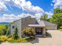 MAGNIFICENT PASSIVE SOLAR HOME WITH AMAZING RIVER VIEWS