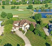 SPECTACULAR CUSTOM HOME ON PRIVATE HERITAGE CLUB GOLF COURSE
