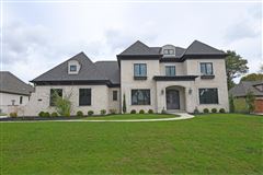 FRENCH-INSPIRED HOME BUILT WITH RESPLENDENT DETAILING