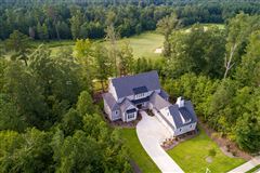 OPEN-CONCEPT CUSTOM HOME IN PRESTIGIOUS CHAPEL RIDGE