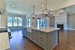NEW CONSTRUCTION ON A LARGE FLAT LOT