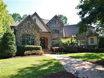 CUSTOM HOME WITH FAIRWAY VIEWS