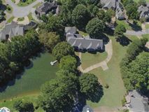 BEAUTIFUL CUSTOM FIVE BEDROOM HOME IN GATED COMMUNITY