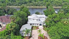 WELCOME HOME TO THIS STUNNING LOW-COUNTRY WATERFRONT HOME