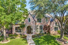 ABSOLUTELY STUNNING CUSTOM GAGE HOME ON CORNER LOT