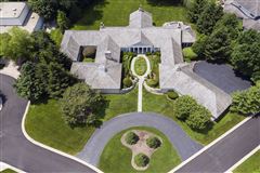 EXQUISITELY APPOINTED CUSTOM HOME SET ON BEAUTIFUL GROUNDS