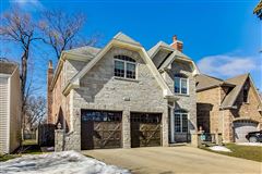 A BEAUTIFULLY CONSTRUCTED BRICK AND STONE HOME