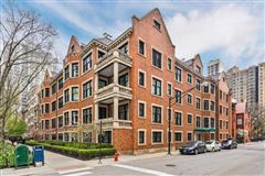 LUXURIOUS CONDO IN THE HEART OF THE GOLD COAST OFFERS ALL NEW FINISHES AND SYSTEMS THROUGHOUT