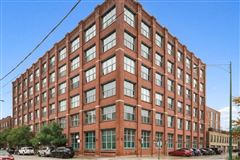 THIS SUN-FILLED CORNER PENTHOUSE LOFT OFFERS BREATHTAKING UNOBSTRUCTED CITY VIEWS