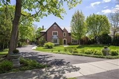 BUILT IN 1929, STATELY BRICK MANOR WITH COACH HOUSE