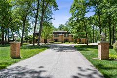 A PRIVATE, BEAUTIFULLY LANDSCAPED THREE ACRE PROPERTY