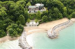 SPECTACULAR ESTATE WITH MESMERIZING LAKE VIEWS AND BEACH LIKE NO OTHER!