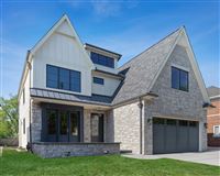 HOME IN IDEAL ELMHURST LOCATION