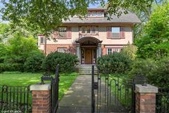 BEAUTIFUL UPDATED COLONIAL REVIVAL SITS ON IMPRESSIVE OVERSIZED CORNER LOT