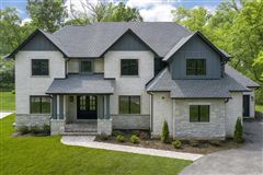JUST COMPLETED NEW CONSTRUCTION IN COVETED LOCATION