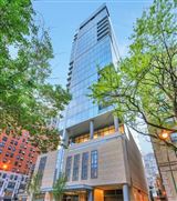 FULL-FLOOR PENTHOUSE AT THE COVETED 4 E ELM BUILDING