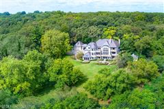GRACIOUSLY TUCKED AWAY, THIS EXQUISITE ESTATE IS SET ON TEN BUCOLIC ACRES