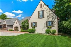 BEAUTIFUL CUSTOM-DESIGNED HOME WITH PRIVATE BRICK PATIO