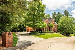 GORGEOUS UPDATED LIGHT-FILLED BRICK HOME IN AN EXCLUSIVE PRIVATE CUL-DE-SAC