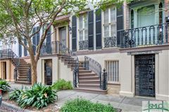 STATELY BRICK TOWNHOME IN SAVANNAH'S NATIONAL HISTORIC LANDMARK DISTRICT