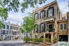 ELEGANT FOUR-BEDROOM, THREE AND ONE HALF-BATH HOME IS NESTLED ON A PRIME CORNER