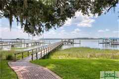 IMMACULATE RIVERFRONT HOME WITH SPECTACULAR SUNSET VIEWS