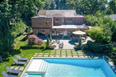 MAGNIFICENT SOUTH FACING STONE AND BRICK COLONIAL
