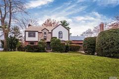 CLASSIC CENTER HALL COLONIAL TUDOR HOME