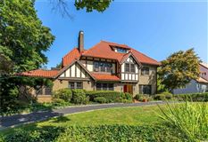 CHARMING BRICK TUDOR HOME