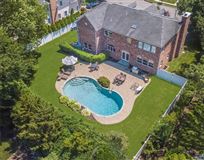 ELEGANT, YOUNG, BRICK COLONIAL