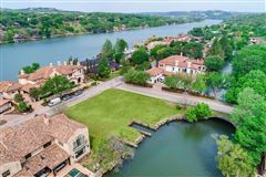 HALF ACRE LOT WITH TWO SLIPS ON PRIVATE CANAL