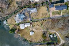 TWO LAGOON-FRONT ESTATE LOTS